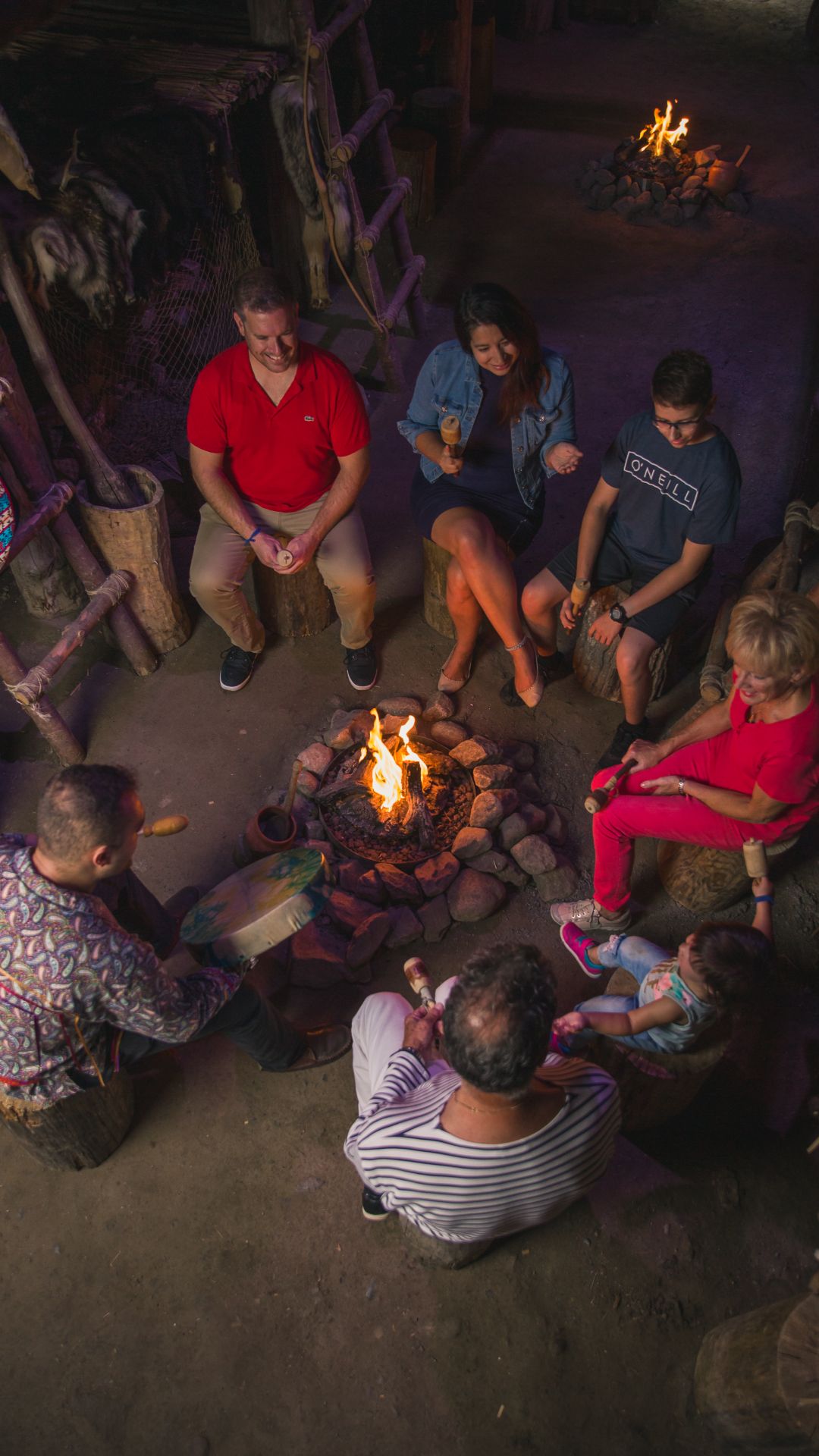 A fireside storytelling session at Wendake, Quebec City, visited by Intrepid groups.